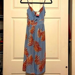 Light blue dress with brown design.